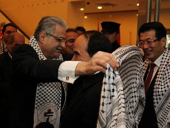 Ambassador Ahmed Ramadan Honoring Scarf to Abdul’ahat Abdurixi