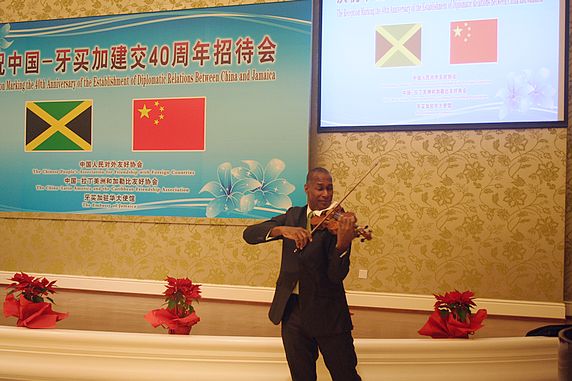 Mr. Steven Woodham, the famous Jamaican Violinist performing at the reception