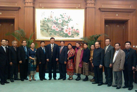 Wu Tao, President of China-Lao Friendship Association meeting with the delegation